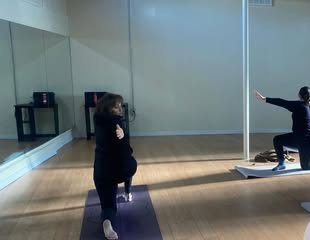 Students practicing yoga at Sanchez Studio